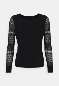 Vero Moda Petite Stickad tröja - black