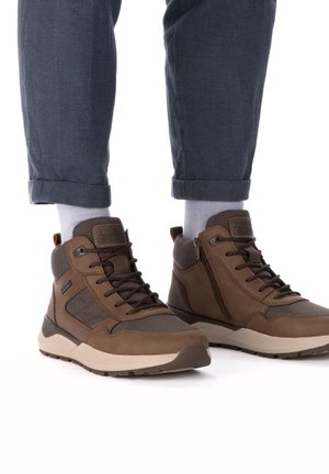 Rieker Bottines à lacets - braun