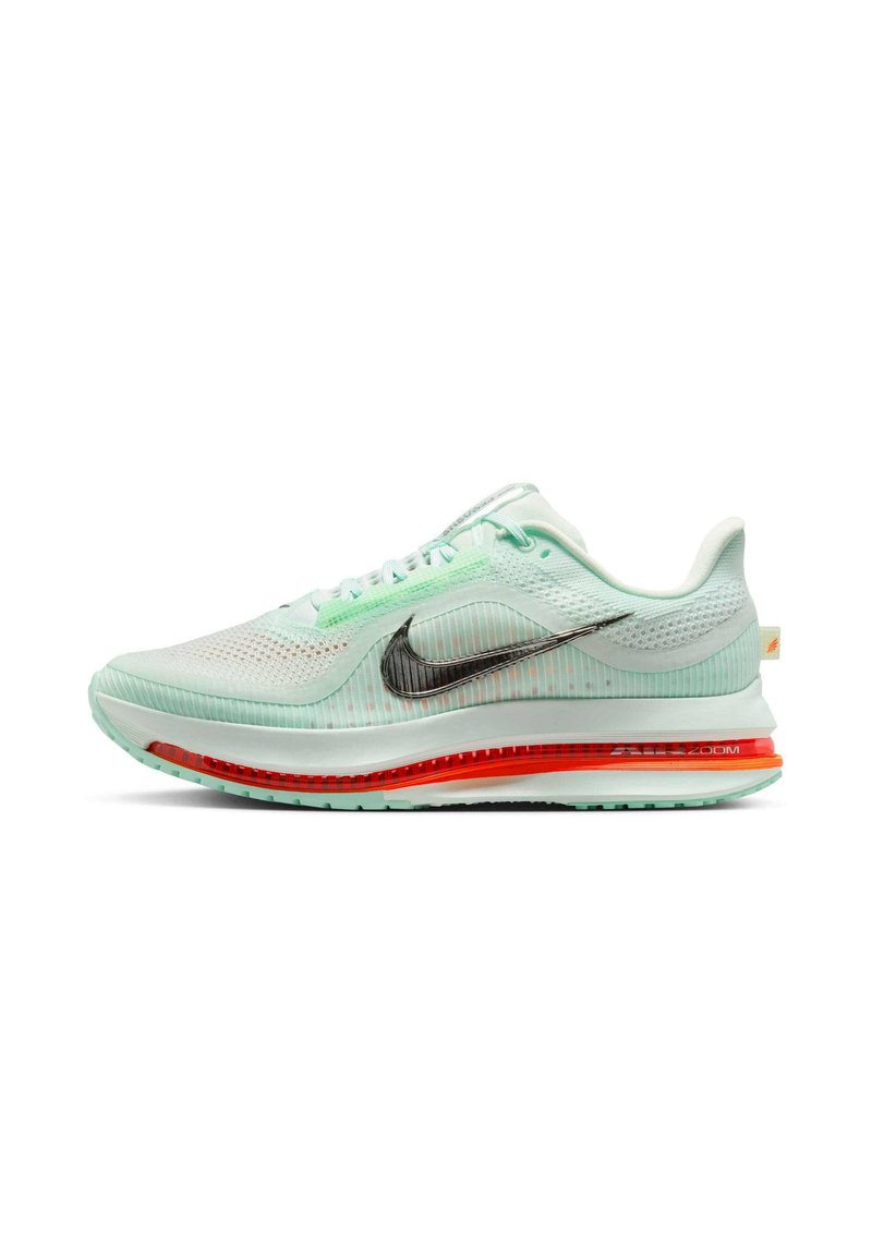 Mint green athletic shoe with a mesh upper, black Nike swoosh, and red air cushioning. Features a textured sole and light lacing system.