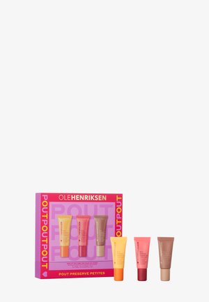 Set di quattro mini prodotti per labbra in tubetti, con colori vivaci: arancione, rosa, rosso e marrone, confezionati in una scatola rosa brillante con testo audace.