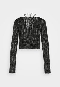 Svart, långärmad, kort topp i öppet stickat tyg med rundad halsringning och intrikat nätmönster.