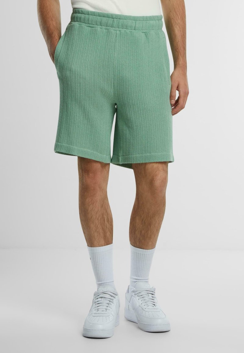 PROHIBITED Tracksuit bottoms - basilgreen