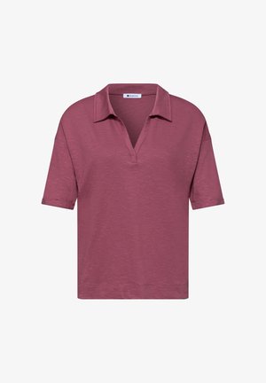 Lyhythihainen, pölyinen ruusunpunainen poolopaita avoimella V-kauluksella ja rento istuvuus, yksivärinen tekstuuri, kauluksen sisäpuolella merkki "Street One".