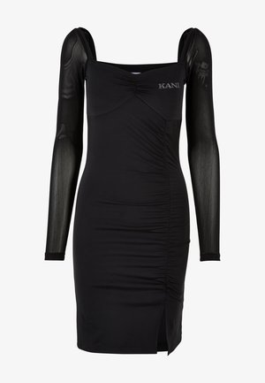 Vestido negro ajustado con mangas largas transparentes, detalle de tela arrugada, escote cuadrado y una abertura lateral, con un sutil logo en el pecho.