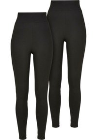 Zwarte leggings van rekbaar materiaal met een hoge tailleband. Het ontwerp heeft een gladde textuur en een aansluitende silhouet.