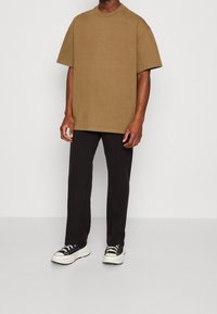Weekday Kalhoty - black