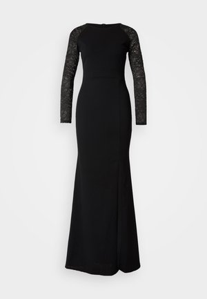 Black long-sleeve dress with lace sleeves, fitted bodice, and a flared skirt. Features a zipper closure at the back and sleek design.