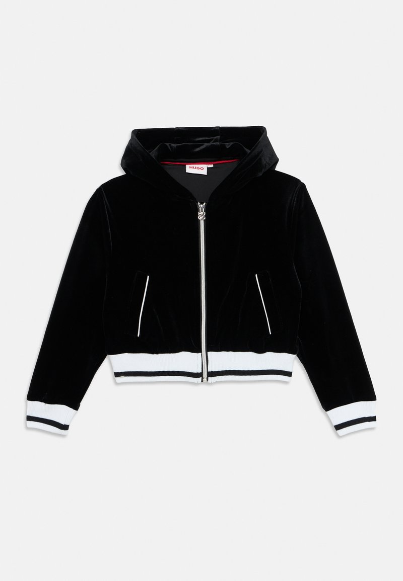 Black velvet cropped jacket with a hood, featuring a silver zipper, two side pockets, and white ribbed cuffs and hem.