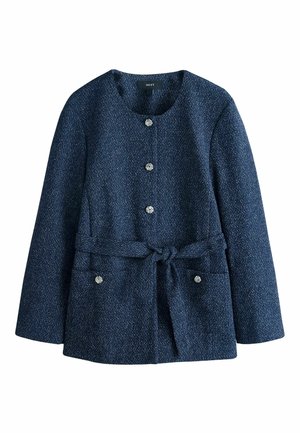 Navy blue tweed jacket with long sleeves, round neckline, silver floral buttons down front, two front pockets, and a tied fabric belt at waist.