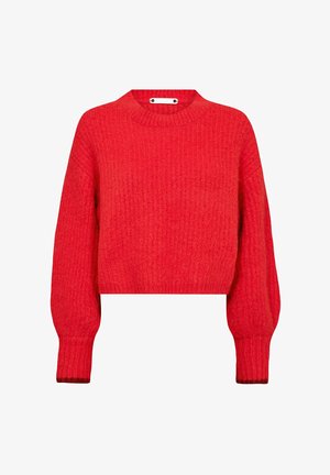 Maglione rosso a cropped con texture a coste, maniche lunghe e collo rotondo. Presenta un accento metallico decorativo all'orrizzonte del collo.