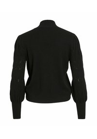 Pull en tricot noir à manches longues avec des manches bouffantes, motif en chevrons sur les manches et poignets ajustés, vu de dos.