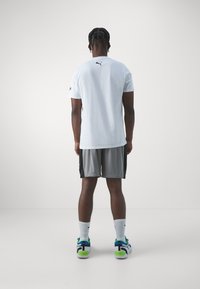 Puma SHOT BLOCKER SHORT - Sportiniai šortai - stormy slate/black