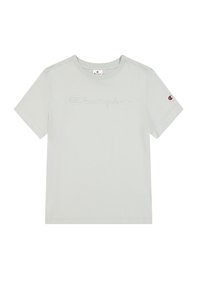 T-shirt en coton gris clair à manches courtes, arborant un logo "Champion" brodé sur le devant et un petit accent logo sur la manche.