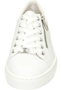 White sneaker with a smooth leather upper, white laces, silver zipper detail on the side, and textured rubber sole. Simple design.