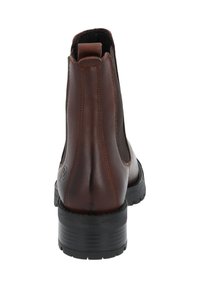 Botas de tobillo de cuero marrón con paneles laterales elásticos, una pequeña pestaña en la parte trasera y una suela de goma negra texturizada.