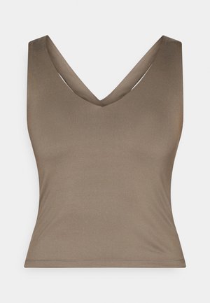 Top marrón sin mangas con un diseño de escote en V profundo, hecho de una tela suave. Presenta una silueta ajustada y un acabado de costura limpio y minimalista.