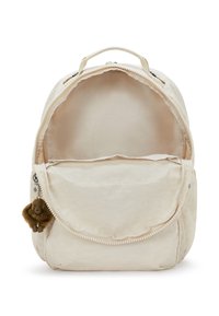 Rucksack in cremefarben aus weichem Stoff, mit Reißverschlussverschluss und einer Innentasche. Enthält einen Plüsch-Affen-Schlüsselanhänger.