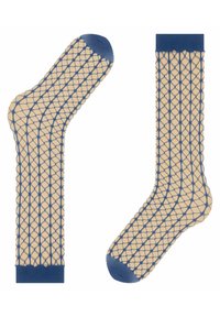 Beige sokken met een blauw visnetontwerp, met een effen blauwe teen en boord, die een getextureerd ruitpatroon over de stof laten zien.