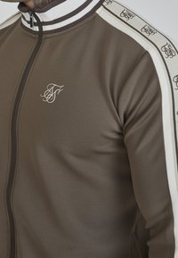 SIKSILK Träningsjacka - brown