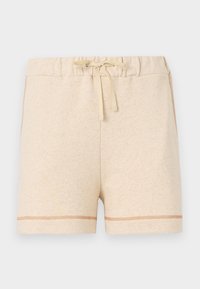 Beige bomullsshorts med elastisk liv og snøring. Har kontrasterende sømmer langs kanten og sidene.