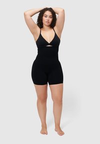 Czarny body z głębokim dekoltem i wycięciem. Wykonane z elastycznego materiału, posiada cienkie ramiączka i dopasowany, krótki krój.
