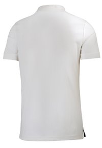 Polo shirt bianco a maniche corte con colletto classico, texture morbida, motivo a coste sottile e spacco laterale all'orlo.