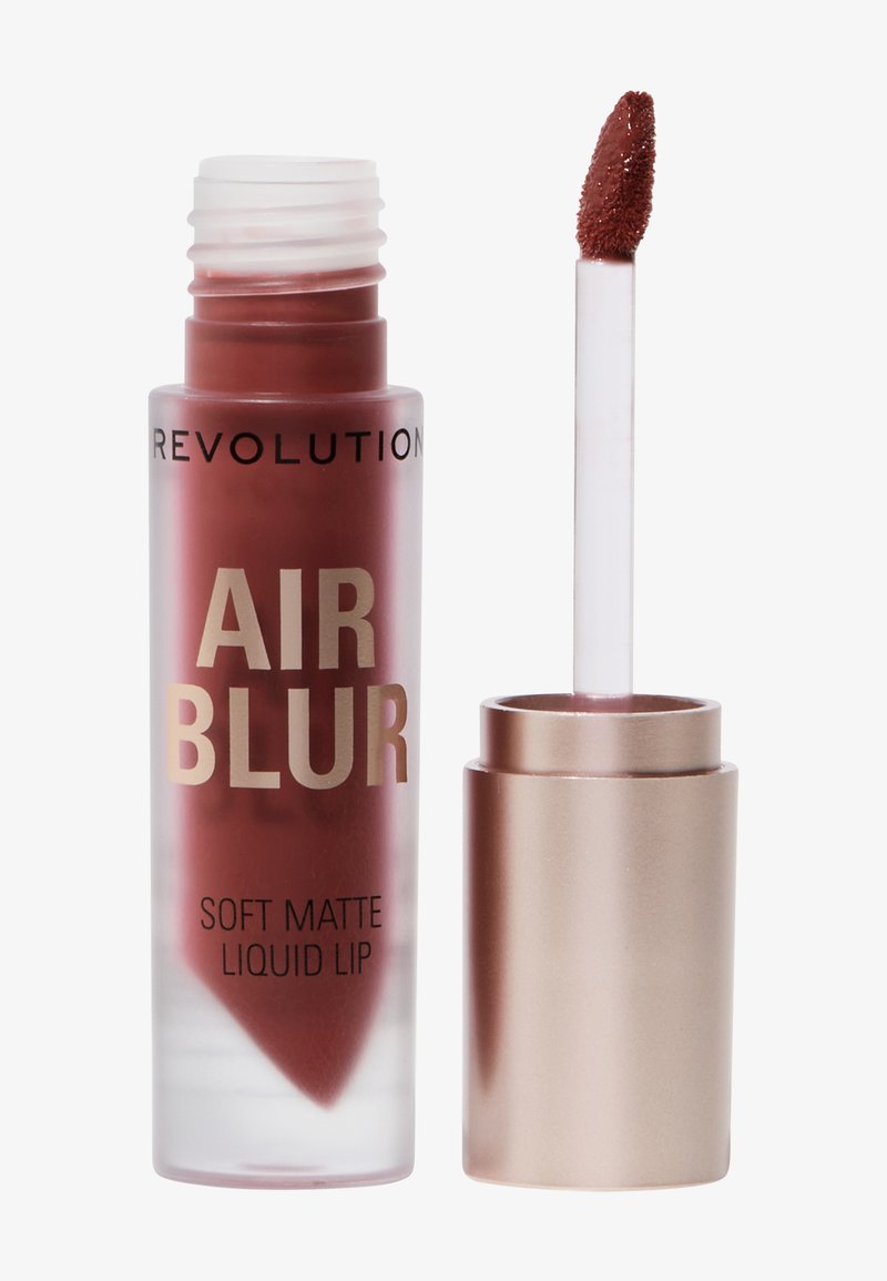 Myk matflytende leppestift i en transparent burgunderbeholder med gulltekst. Inkluderer en klar applikatorstang med en avrundet tupp.