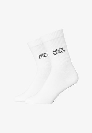 Pair of white crew socks with ribbed cuffs and black text "MERRY X-MAU!" near the top on a white background.
