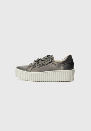 Gray leather-platform sneaker with decorative zipper, textured rubber sole, and rounded toe. Features laces and metallic accents.