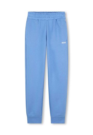 Pantalons de survêtement bleus en tissu doux, dotés d'une taille élastique, de poches latérales et d'un petit logo blanc sur la cuisse gauche.