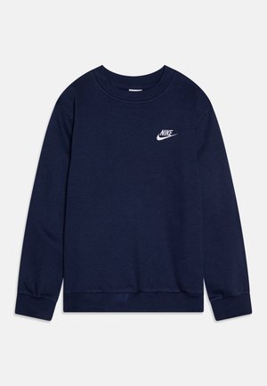 Sudadera azul marino de algodón suave, con cuello redondo, puños acanalados y un pequeño logotipo blanco de Nike en el pecho.