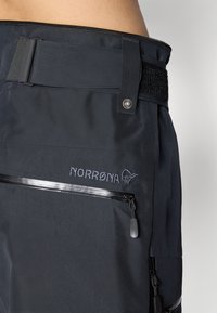 Norrøna LOFOTEN GORE-TEX INSULATED PANTS - Lyžiarske nohavice - caviar black