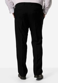 Černé kalhoty na míru se střihem rovného nohavice, s bočními kapsami a zadními kapsami s lemem. Vyrobeno z hladké, strukturované tkaniny.