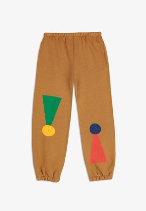 Brown sweatpants met een elastische tailleband, versierd met kleurrijke geometrische vormen: groene driehoek, gele cirkel, blauwe cirkel en rode driehoek.