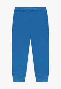 Blauwe trainingsbroek met elastische tailleband en geribbelde manchetten. Gladde textuur, rechte snit, geen patronen of hardware-details.