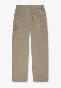 Μπεζ cargo παντελόνι σε χαλαρή γραμμή, με δύο πίσω τσέπες, πλευρικές cargo τσέπες και ενισχυμένες ραφές. Ομαλό, ανθεκτικό βαμβακερό ύφασμα.