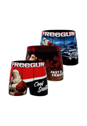 Boxers avec des motifs colorés de Père Noël, dans des couleurs rouge et noire, avec des motifs dynamiques, du texte blanc et une taille élastique avec "FREEGUN."