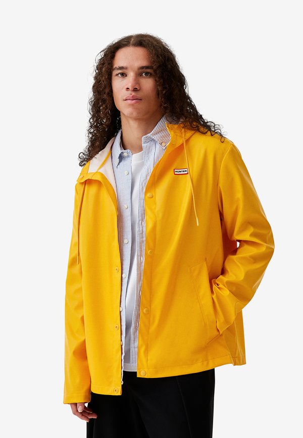 IZZY UNISEX - Waterproof jacket - gold fusion