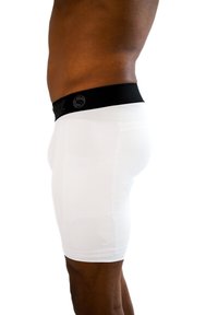 Boxer da uomocon cintura elasticizzata nera con logo. Texture liscia, design aderente e lunghezza fino al ginocchio.