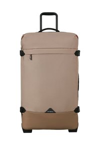 Large beige and brown soft-sided suitcase with telescopic handle, front zip pocket, compression straps, and Samsonite logo at the bottom center.