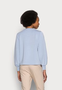 someday. UNNEA - Camisola - humble blue