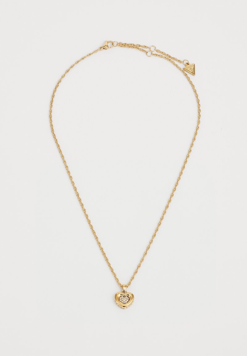 Gouden halsketting met een gedraaid kettinkje en een hartvormige hanger met een kleine kristal in het midden. Verstelbare sluiting aan de achterkant.