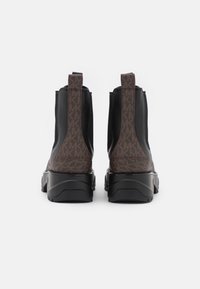MICHAEL Michael Kors Stivaletti con plateau - black