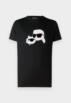 Black T-shirt with cartoon graphic of a person with white hair and a cat, both wearing large black sunglasses, centered on front.