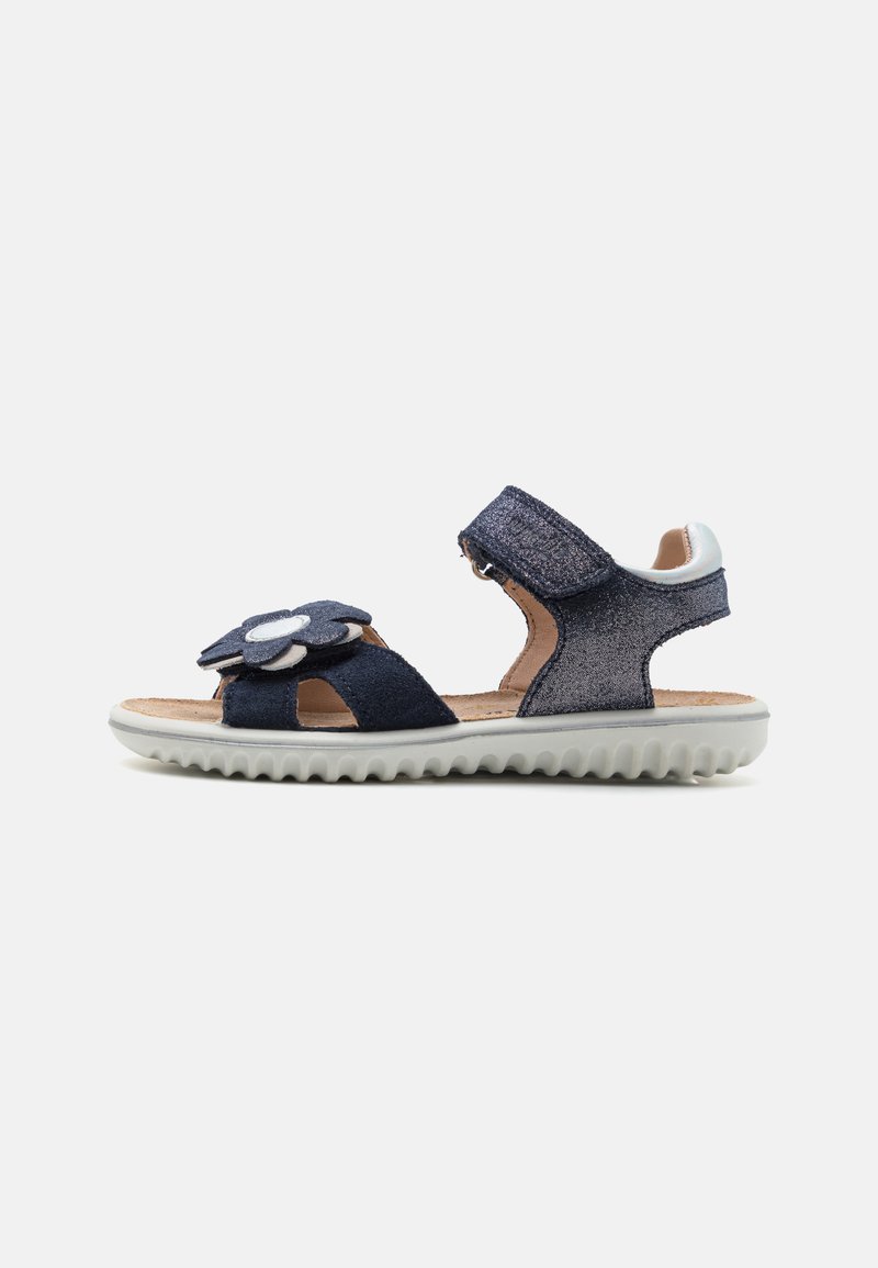 Mørkeblå sandaler med overdel i semsket skinn, glitterdetaljer, blomstermotiv på stroppen, borrelås-lukking og hvit strukturert gummisåle.