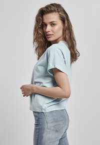Urban Classics LADIES SHORT PIGMENT DYE CUT ON SLEEVE TEE - T-Shirt basic - seablue