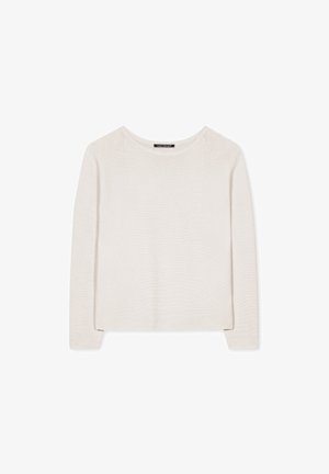 Light beige long-sleeve knit top with a scoop neck, featuring a textured surface and side slits at the hem for ease of movement.