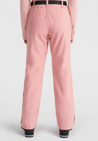 Pink snow pants feature a straight cut, elastic waistband with adjustable tabs, and zippers at the ankles. Made of durable, water-resistant material.