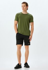 Koton SPORT  - Verryttelyhousut - black