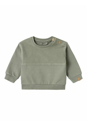 Sweatshirt en coton vert avec col rond, panneau texturé sur la poitrine et accents en boutons en bois. Les poignets et l'ourlet côtelés ajoutent de la définition.